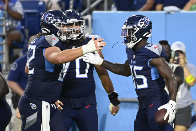 NASHVILLE, TN - AUGUST 20: Tennessee Titans quarterback Malik Willis (7)  catches the snap during the Tampa Bay Buccaneers-Tennessee Titans Preseason  game on August 20, 2022 at Nissan Stadium in Nashville, TN. (