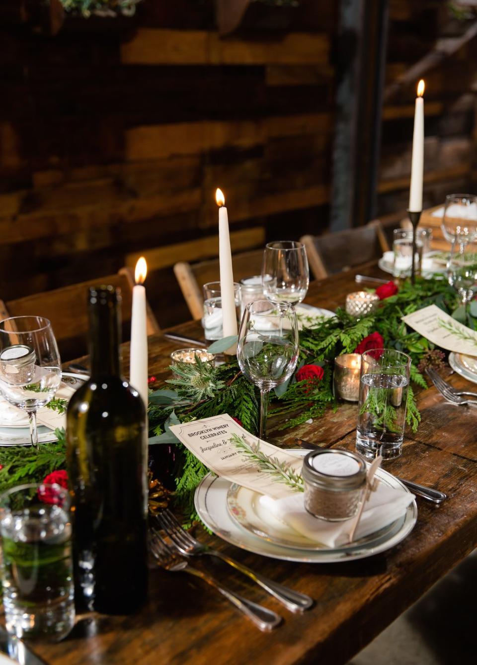 <p>Incorporate traditional Christmas hues into your centerpiece with inspiration taken directly from nature. This sweeping pine branch garland is adorned with just enough red roses to create a classic holiday aesthetic. </p><p><em>Via <a href="http://sachirose.com/" rel="nofollow noopener" target="_blank" data-ylk="slk:Sachi Rose;elm:context_link;itc:0;sec:content-canvas" class="link ">Sachi Rose</a> </em></p>