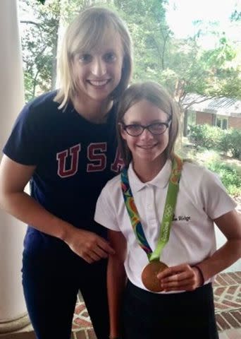 <p>Courtesy of Bruce Gemmell</p> Katie Ledecky with Erin Gemmell in 2012