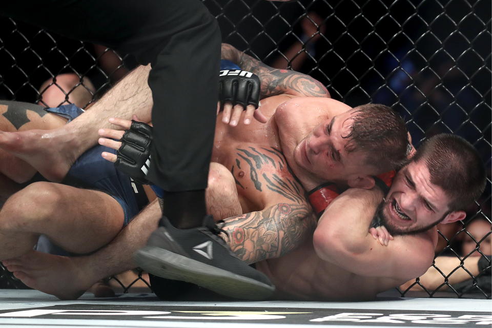 ABU DHABI, UNITED ARAB EMIRATES  SEPTEMBER 7, 2019: UFC lightweight champion Khabib Nurmagomedov (R) and interim UFC lightweight champion Dustin Poirier fight in their title unification bout at the UFC 242 mixed martial arts tournament. Valery Sharifulin/TASS (Photo by Valery Sharifulin\TASS via Getty Images)