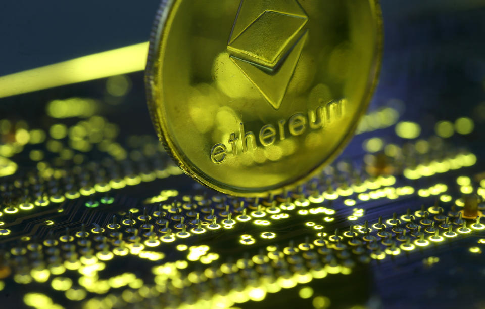 Representation of the Ethereum virtual currency standing on the PC motherboard is seen in this illustration picture, February 3, 2018. REUTERS/Dado Ruvic/Illustration