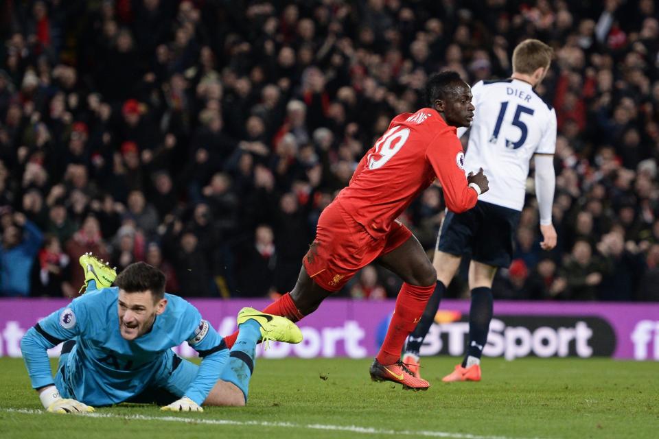 Sadio Mane wheels away after making it 1-0 