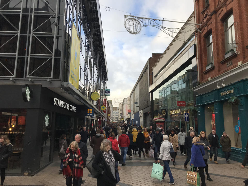 Shoppers in Belfast city centre before Christmas. Pic: PA