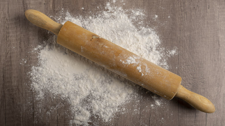 Rolling pin on wheat flour 