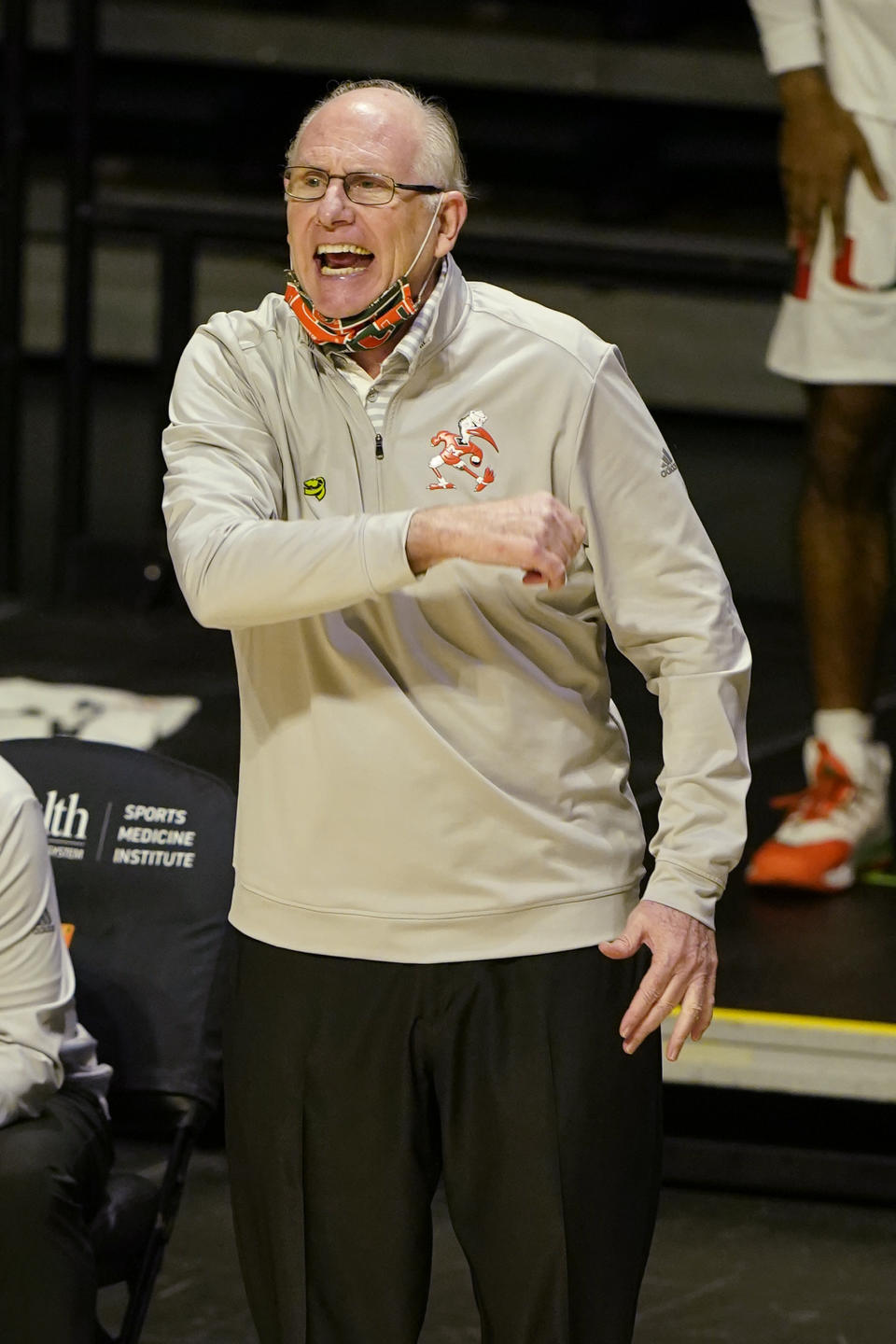 Miami head coach Jim Larrañaga gestures during the second half of an NCAA college basketball game against Duke, Monday, Feb. 1, 2021, in Coral Gables, Fla. (AP Photo/Marta Lavandier)