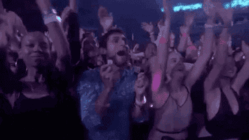 People dancing at a concert