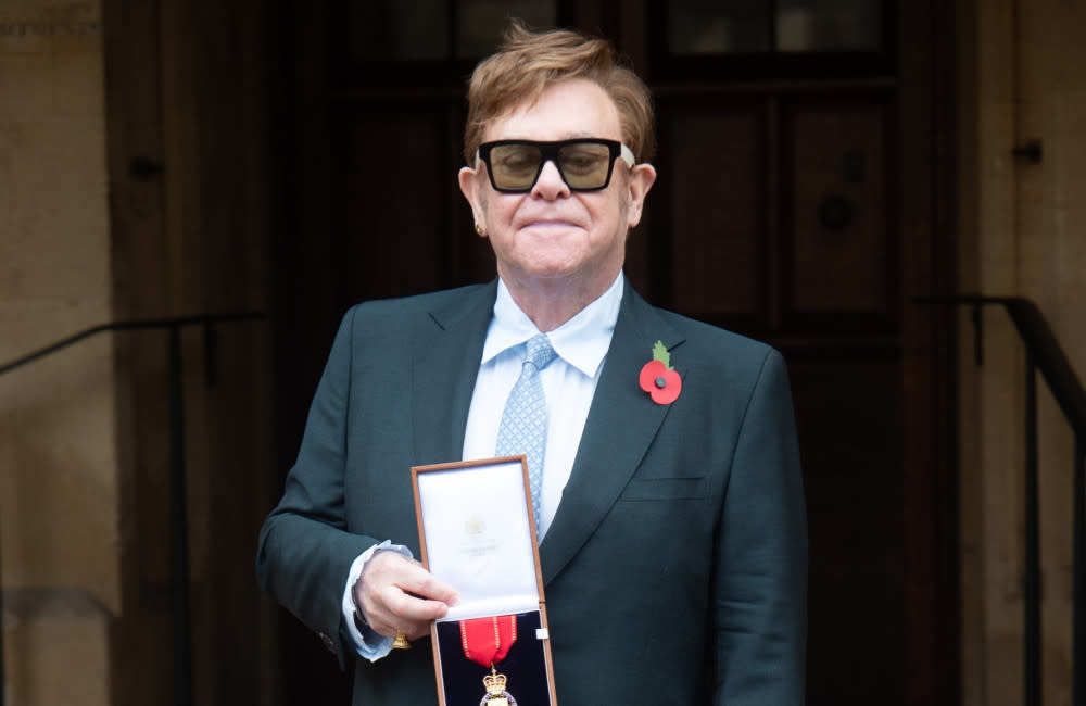 Sir Elton John receiving his Companion of Honour credit:Bang Showbiz