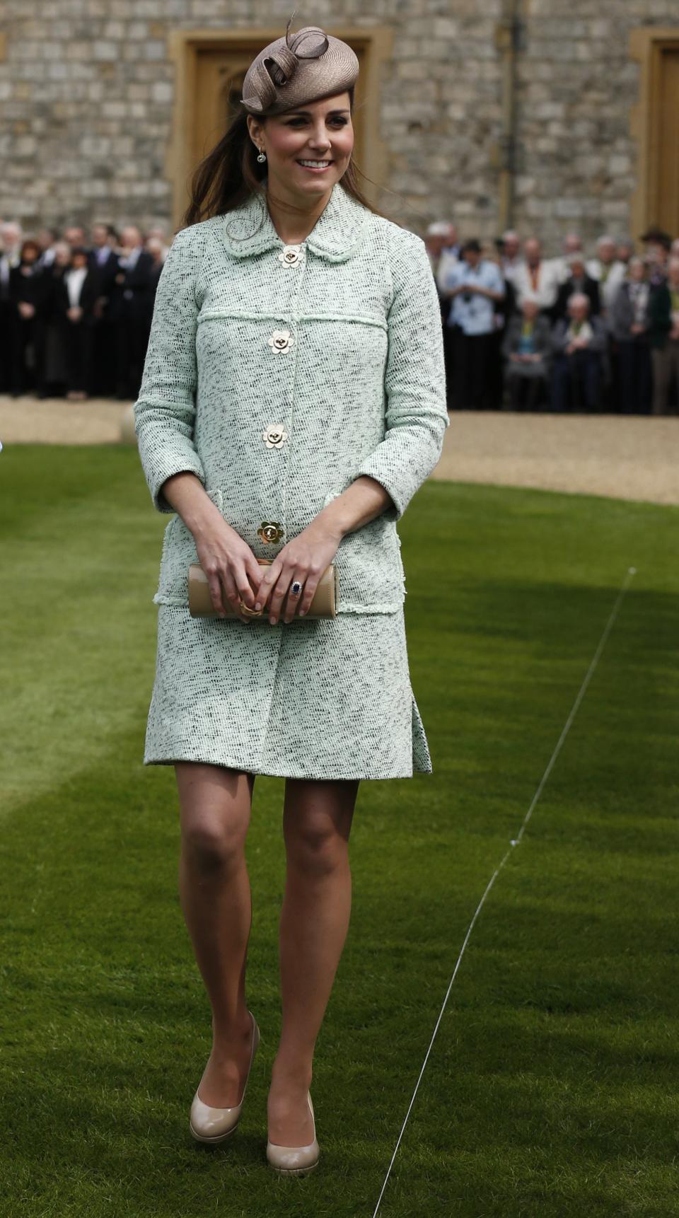 <p>Kate donned a bouclé-effect coat by Mulberry for The National Review of Queen’s Scouts in April, 2013. She accessorised the look with taupe heels by LK Bennett. <em>[Photo: Getty]</em> </p>