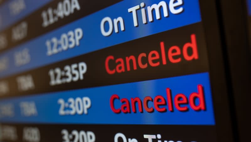 A digital display shows several canceled flights at Salt Lake International Airport in Salt Lake City on Tuesday, Dec. 27, 2022. The U.S. Department of Transportation unveiled new rules on Wednesday, April 24, 2024, requiring airlines to provide automatic refunds when a flight has been canceled or significantly delayed.