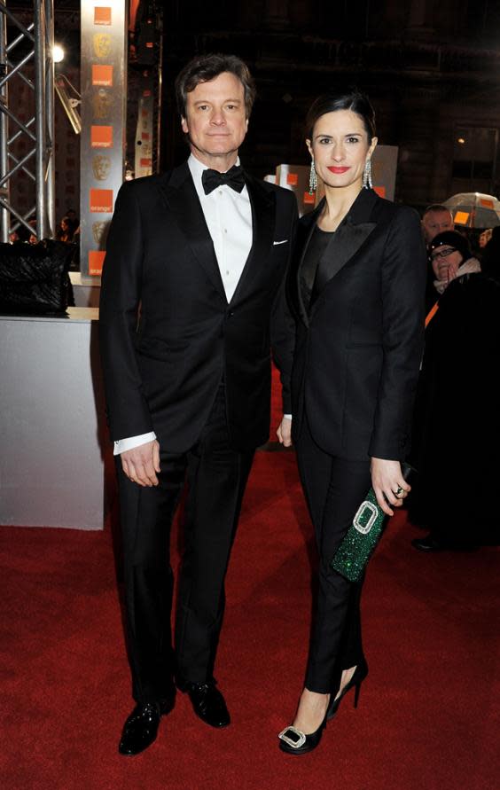 Livia Firth with Colin Firth on the red carpet. She leveraged the global attention at awards events to provide as a platform to talk about environmental and social justice(Getty Images)