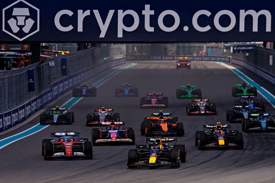 May 4, 2024; Miami Gardens, Florida, USA; Red Bull Racing driver Max Verstappen (1) leads the start of the F1 Sprint Race at Miami International Autodrome. Mandatory Credit: Peter Casey-USA TODAY Sports