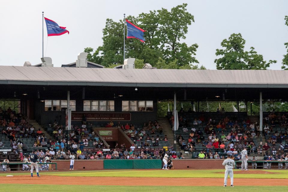 Evansville Otters fans take in the ball game during the Salute to the Negro League Night at the historic Bosse Field on Juneteenth Saturday evening, June 19, 2021. The event was in partnership with the Evansville African American Museum. 