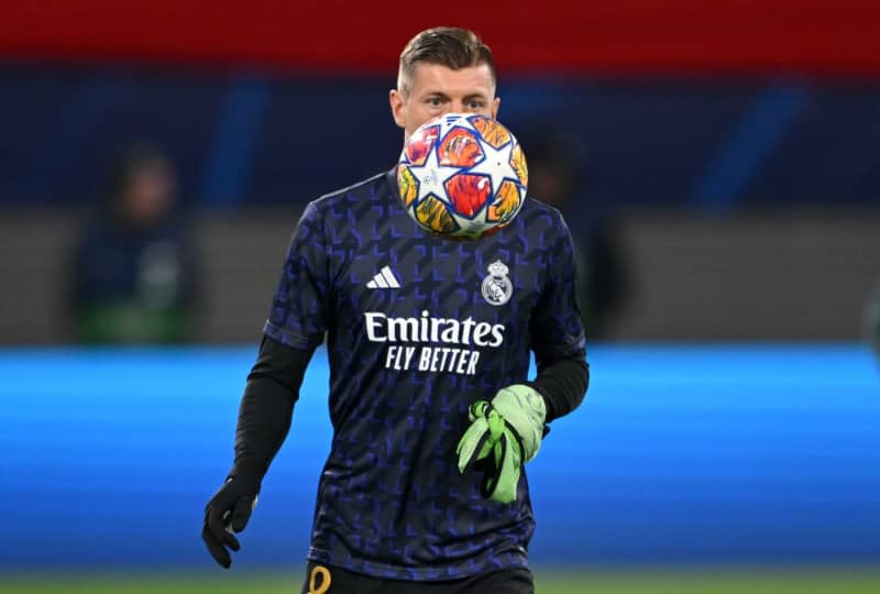 Real Madrid's Toni Kroos warms up prior to the start of the UEFA Champions League round of 16 first leg soccer match between RB Leipzig and Real Madrid at the Red Bull Arena. World Cup winner Toni Kroos will come out of international retirement and return into the Germany team for March friendlies and the Euro 2024 tournament on home ground. Robert Michael/dpa