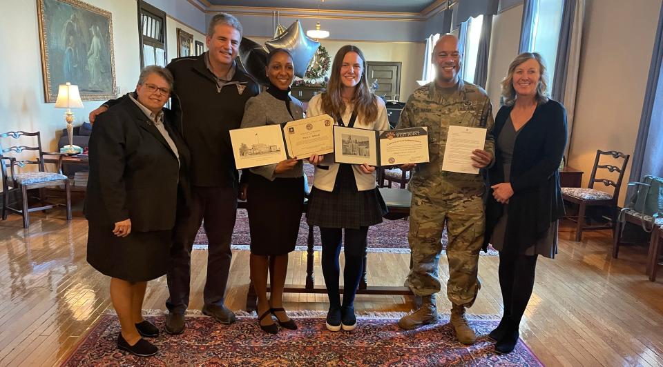 (Left to right): S. Lisa D. Gambacorto, RSM, Ed.S. (Directress), Mr. Jamie Schleck, Erica Jeffries Purdo (Civilian Aide to the Secretary of the Army), Mary Claire Schleck, Major Antonio C. Nash of the United States Military Academy at West Point, and Pamela Schleck.