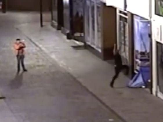 Two arrested after man caught drop-kicking tent with homeless people inside