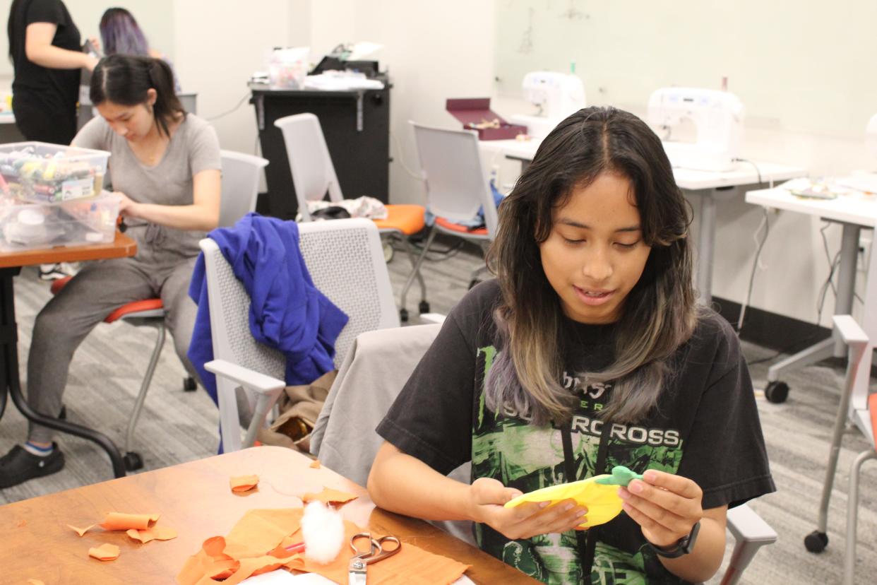 Aleena Aguirre, a McNair High School Student, constructs a 3D printing model as part of her final project for the innovation course at University of the Pacific's Summer High School Institute.