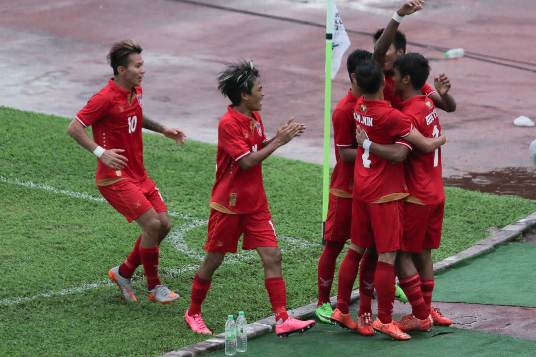 Myanmar celebrates after scoring the second goal against Singapore in the opening Group A match in the SEA Games at the Selayang Stadium on Monday (14 August). Photo: Fadza Ishak for Yahoo