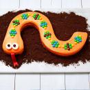 <p>Marshmallow crispy treats + royal icing + Halloween candy = this delicious dessert!</p><p><a href="https://www.womansday.com/food-recipes/food-drinks/recipes/a11984/peanut-chocolate-banana-snakes-recipe-123645/" rel="nofollow noopener" target="_blank" data-ylk="slk:Get the;elm:context_link;itc:0;sec:content-canvas" class="link "><strong><em>Get the </em></strong></a><em><strong><a href="https://www.womansday.com/food-recipes/a36831300/snake-cake-recipe/" rel="nofollow noopener" target="_blank" data-ylk="slk:Snake Cake recipe.;elm:context_link;itc:0;sec:content-canvas" class="link ">Snake Cake recipe. </a></strong></em></p>