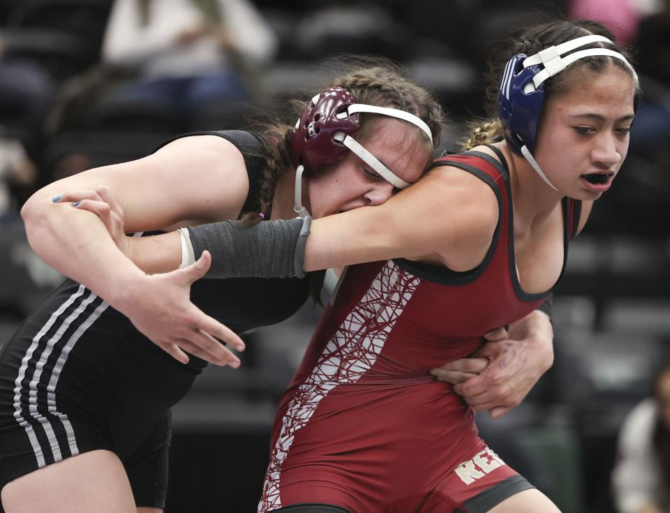Cedar City’s Taiana Palmer and Pine View’s Lily Pomeroy compete in the 4A State Championships at Utah Valley University in Orem on Wednesday, Feb. 14, 2024. | Laura Seitz, Deseret News