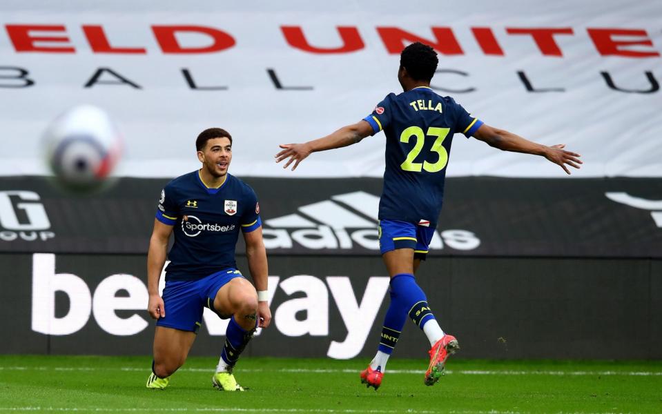 Che Adams of celebrates after scoring his teams second goal during the Premier League match between Sheffield United and Southampton at Bramall Lane on March 06, 2021 in Sheffield, England - Che Adams scorcher gets Southampton back to winning ways at struggling Sheffield United - GETTY IMAGES