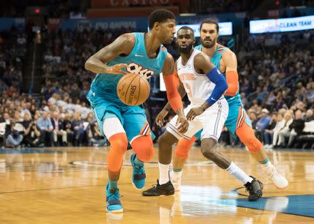 Nov 14, 2018; Oklahoma City, OK, USA; Oklahoma City Thunder forward Paul George (13) dribbles against the New York Knicks during the second half at Chesapeake Energy Arena. Rob Ferguson-USA TODAY Sports