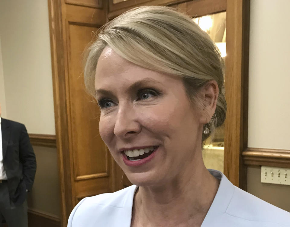 FILE - In this Friday, May 18, 2018, file photo, Arkansas Supreme Court Justice Courtney Goodson speaks to reporters at the Pulaski County Courthouse in Little Rock, Ark. Goodson is being challenged by David Sterling, the chief counsel for the Department of Human Services, for the nonpartisan state Supreme Court seat. (AP Photo/Andrew DeMillo, File)