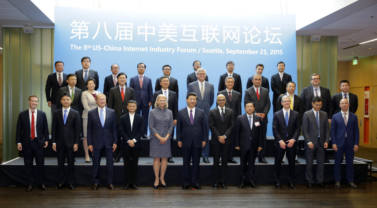 REDMOND, WA - SEPTEMBER 23:  Chinese President Xi Jinping (front row, C) poses for a photo with a group of CEOs and other executives at the main campus of Microsoft Corp. September 23, 2015  in Redmond, Washington. Xi and top executives from U.S. and Chinese companies discussed a range of issues, including trade relations, intellectual property protection, regulation transparency and clean energy, according to published reports. Pictured are: (front row, L-R): Facebook's Mark Zuckerberg, JD.com's Liu Qiangdong, Cisco's John Chambers, Alibaba's Jack Ma, IBM's Ginni Rometty, Chinese President Xi Jinping, Microsoft's Satya Nadella, China's Internet czar Lu Wei, Apple's Tim Cook, Tencent's Pony Ma, and Amazon's Jeff Bezos.  (Photo by Ted S. Warren-Pool/Getty Images)