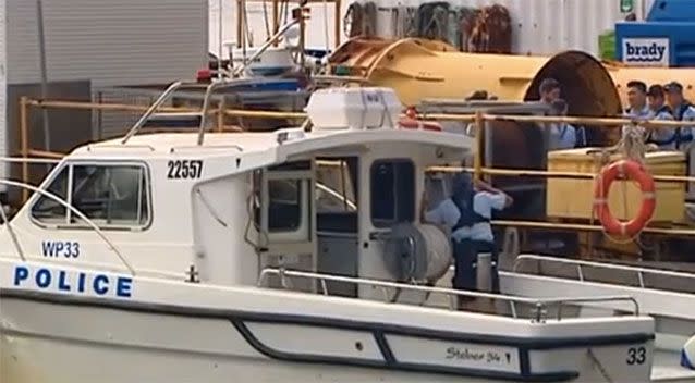 Water Police raced out to the barge. Picture: 7 News