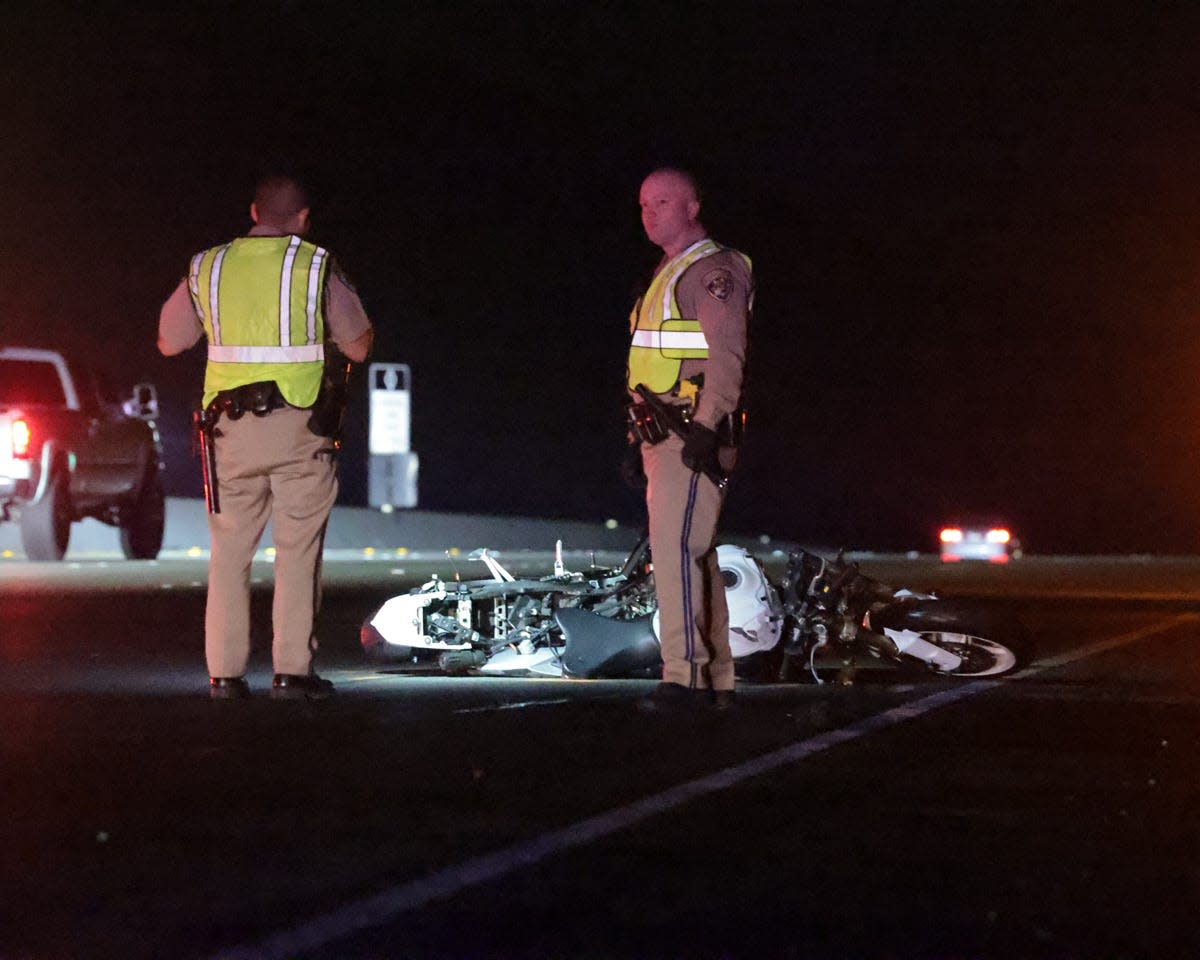 California Highway Patrol officers at the scene of a fatal accident involving a motorcycle on Highway 118 east of Simi Valley Saturday night.