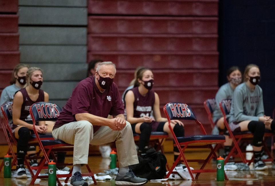 Henderson County Asst. Coach Phil Gibson takes a look at the scoreboard during their Second Region Tournament  championship game against Union County at Hopkins County Central High School Monday, March 29, 2021.