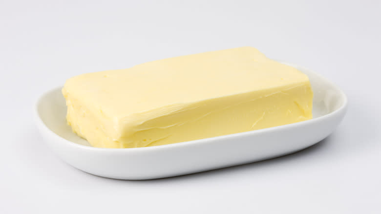 stick of butter in tray