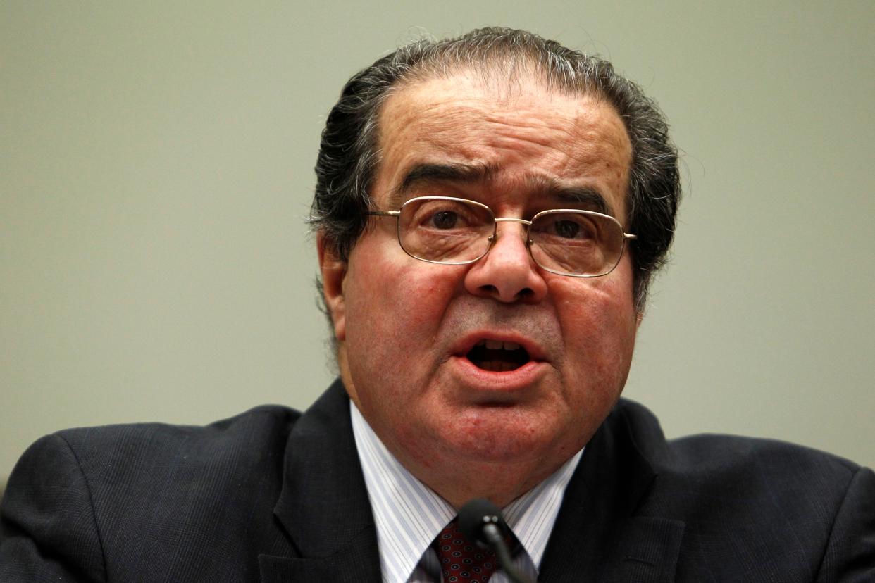 Supreme Court Justice Antonin Scalia testifies before a House Judiciary Commercial and Administrative Law Subcommittee hearing on ?The Administrative Conference of the United States? on Capitol Hill in Washington May 20, 2010. REUTERS/Kevin Lamarque (UNITED STATES - Tags: POLITICS) - RTR2E5SN