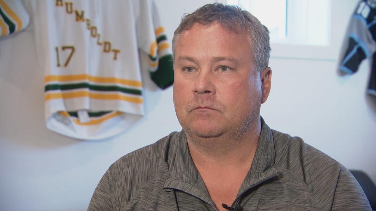 Scott Thomas's son, Evan, was killed in 2018 after the Humboldt Broncos junior hockey team's bus collided with a semi truck. He said that he doesn't agree with the changes that have been made to relax licensing regulations for foreign workers in agriculture.  (Chanss Lagaden/CBC - image credit)