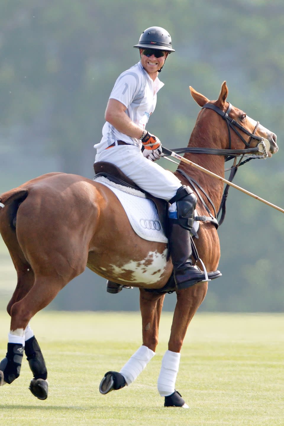 <p>Harry smiles during the Audi Polo Challenge at Coworth Park Polo Club in Ascot, England.</p>