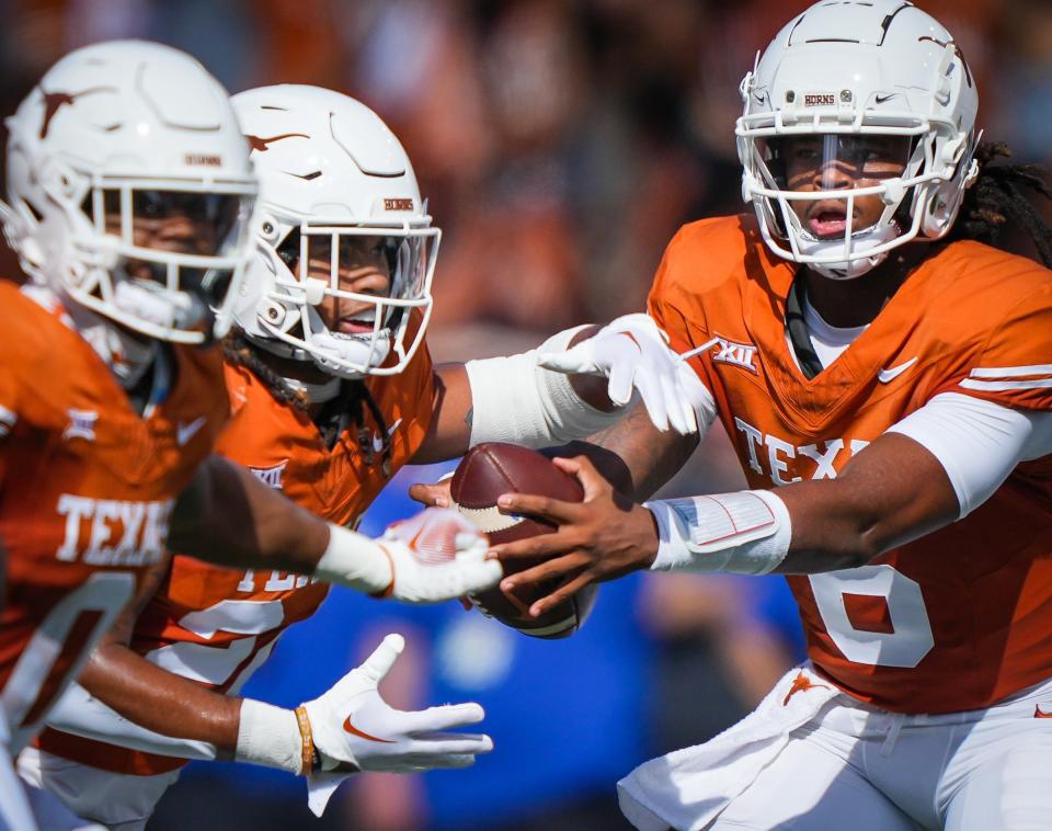 Texas quarterback Maalik Murphy fakes a handoff to running back Jonathon Brooks in the first quarter, but that was a rarity. The former backup, making his first career start in place of the injured Quinn Ewers, relied on Brooks all day. Brooks finished with 98 yards and a touchdown in the Longhorns' 35-6 win over BYU.
