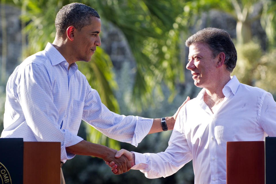 Colombia President Juan Manuel Santos (R) and U.S. President Barack Obama shake hands during a joint press conference in the framework of the VI Summit of the Americas at Casa de Huespedes in Cartagena, Colombia, on April 15, 2012.