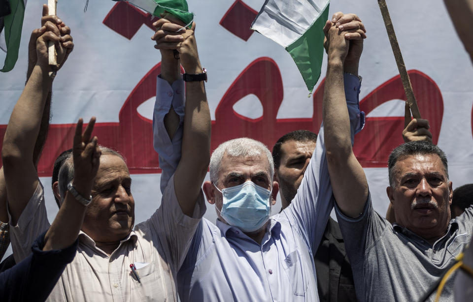 Palestinian Hamas leader in the Gaza Strip, Yahya Sinwar, center, attends a demonstration against Israeli plans for the annexation of parts of the West Bank, in Gaza City, Wednesday, July 1, 2020. (AP Photo/Khalil Hamra)