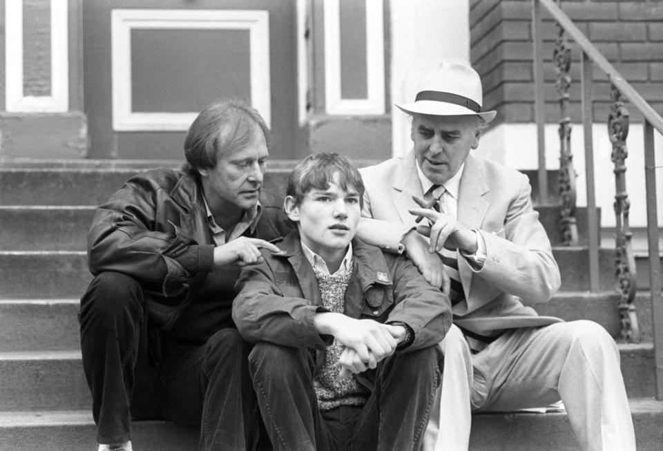 Minder stars Dennis Waterman (left) and George Cole (right) with Chris Routh (PA) (PA Wire)