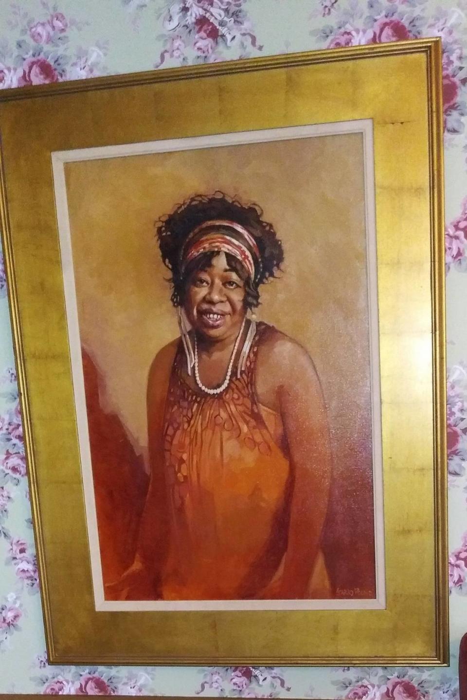 This portrait of Gertrude Pridgett “Ma” Rainey, by artist Garry Pound, hangs in the Ma Rainey House & Museum of the Blues in Columbus, 805 Fifth Ave.