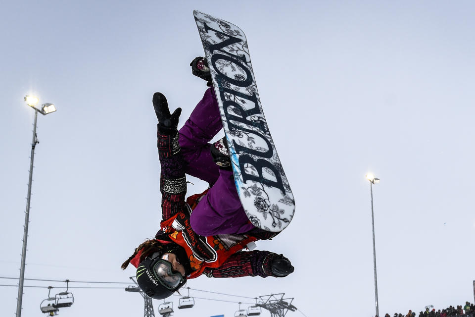 FILE - In this Feb. 1, 2015, file photo, Chloe Kim competes during the women's snowboard halfpipe final at the Burton European Open in Laax, Switzerland. Jake Burton Carpenter, the man who changed the game on the mountain by fulfilling a grand vision of what a snowboard could be, died Wednesday night, Nov. 20, 2019, of complications stemming from a relapse of testicular cancer. He was 65. (AP Photo/Keystone,Gian Ehrenzeller, File)