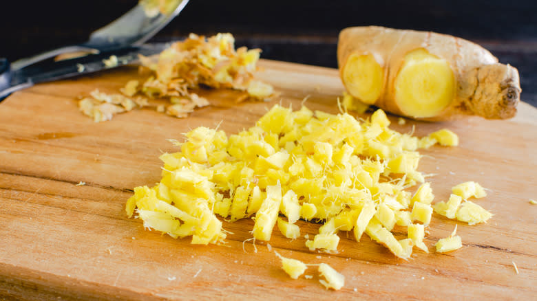 Minced ginger on cutting board