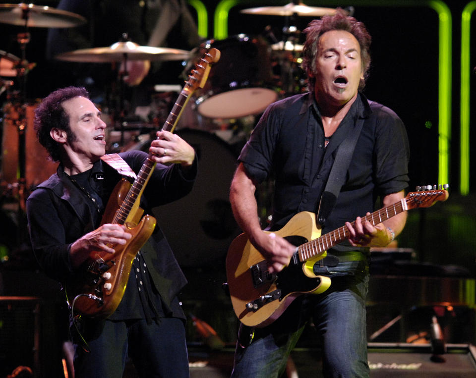 FILE - Bruce Springsteen, right, and Nils Lofgren of the E Street Band perform during their concert at the Los Angeles Sports Arena on Oct. 29, 2007. Springsteen's latest album, "Letter To You" will be released on Oct. 23. (AP Photo/Chris Pizzello, File)