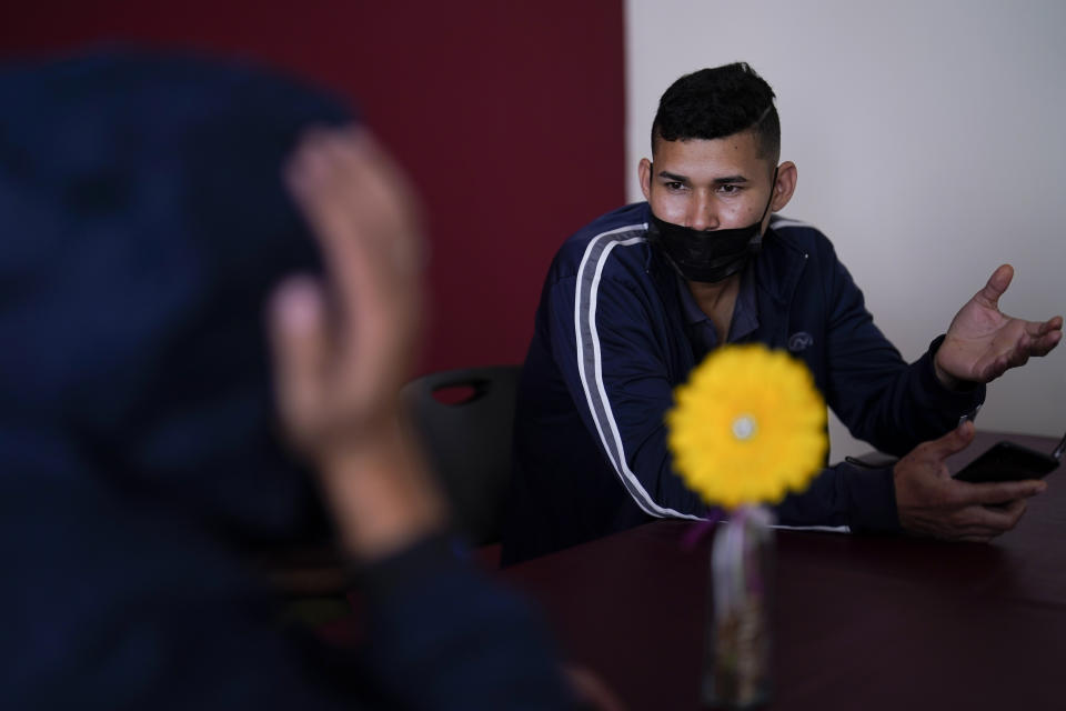 Emil Cardenas, of Colombia, waits at a shelter for migrants Thursday, April 21, 2022, in Tijuana, Mexico. Colombians were stopped at the U.S.-Mexico border more than 15,000 times in March, up nearly 60% from February and nearly 100-fold over last year, according to U.S. Customs and Border Protection figures. Many fly to Mexico City or Cancún and take a bus or another plane to border towns. (AP Photo/Gregory Bull)