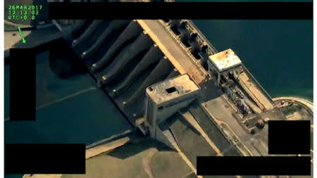 A still picture dated March 26, 2017 and released by Syrian Democratic Forces (SDF) shows the Tabqa dam on the Euphrates river, Syria. Social Media Website via Reuters TV