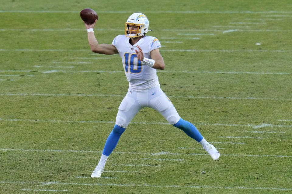 Los Angeles Chargers quarterback Justin Herbert (10) throws during the second half of an NFL football game against the Denver Broncos, Sunday, Nov. 1, 2020, in Denver. (AP Photo/Jack Dempsey)