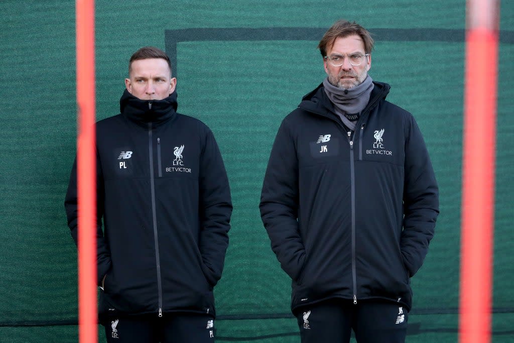 Pep Lijnders (left) said he trusted medical departments to make the right decisions on Covid-19 postponements (Nick Potts/PA) (PA Archive)