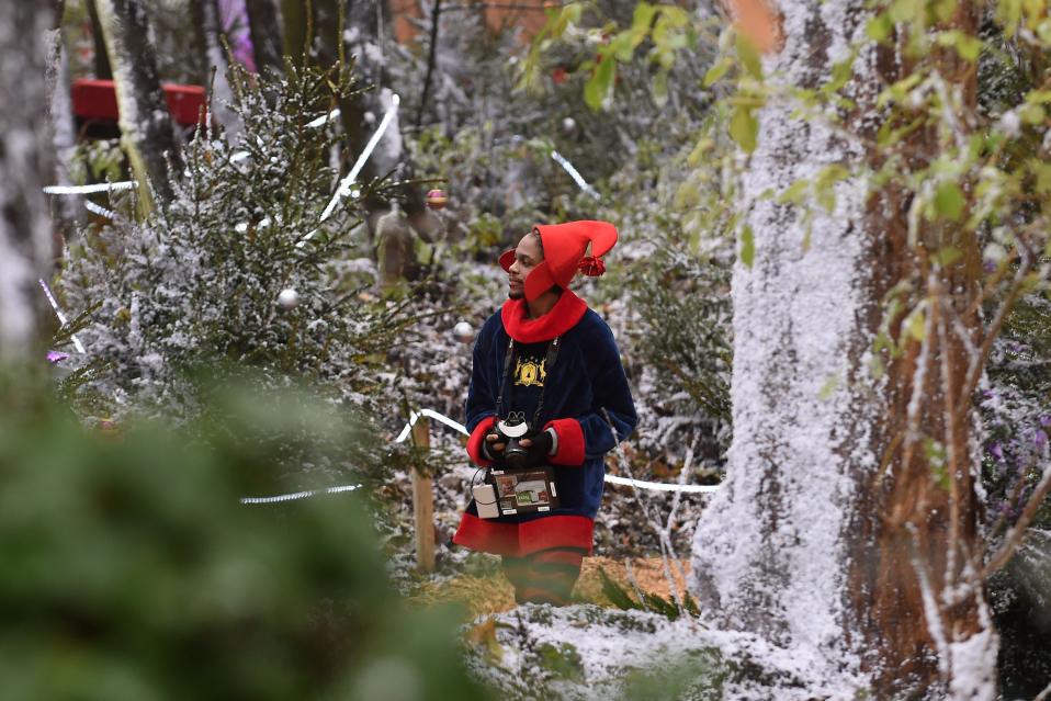 File photo dated 26/11/14 of workers in the Wonderland Walk at The Magical Journey Christmas attraction based at The Belfry Resort in Sutton Coldfield, Birmingham, as Laurence Llewelyn Bowen expressed his shock at the closure of the Christmas experience he designed after a major financial backer pulled out with nine opening days left. PRESS ASSOCIATION Photo. Issue date: Tuesday December 16, 2014. The celebrity interior designer told the Press Association he was 