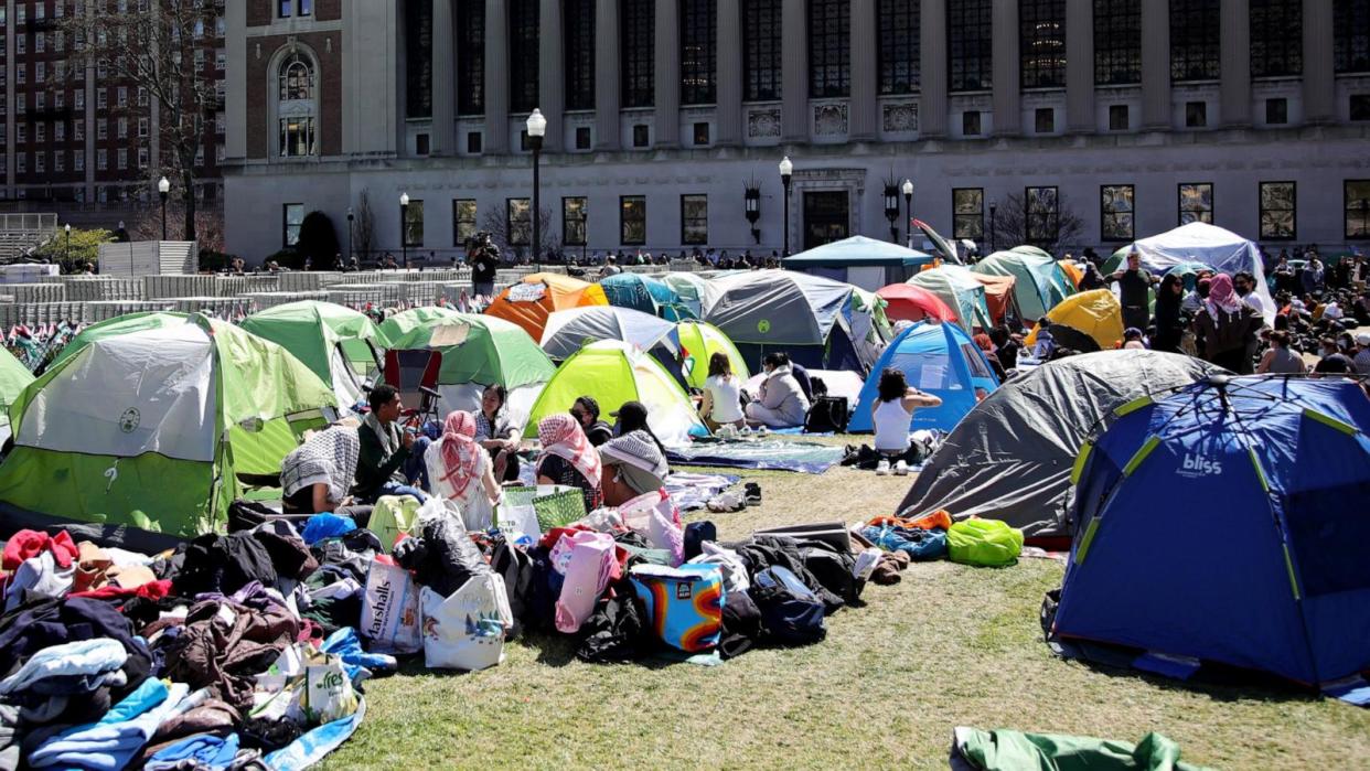 PHOTO: Pro-Palestinian students and activsts gather at a protest encampment on the campus of Columbia University, in New York, on April 25, 2024.  (Leonardo Munoz/AFP via Getty Images)