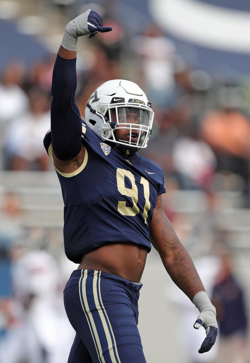 Akron defensive lineman CJ Nunnally IV celebrates sacking Morgan State quarterback Carson Baker on Sept. 9.