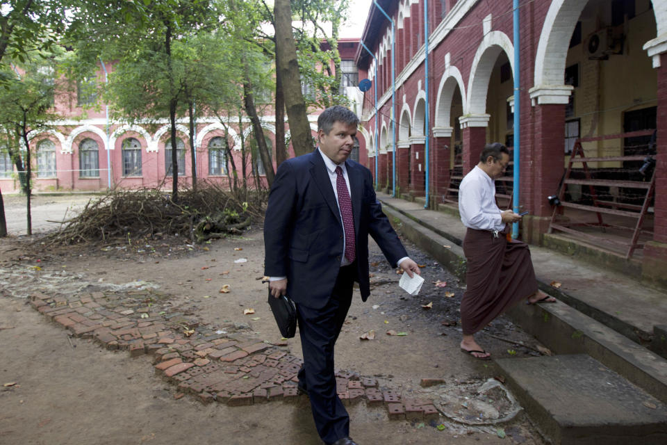 Kevin Krolicki, Reuters Regional Editor of Asia, arrives at the court for the trial of two Reuters journalists Monday, Sept. 3, 2018, in Yangon, Myanmar. The court sentenced two Reuters journalists to seven years in prison Monday for illegal possession of official documents, a ruling that comes as international criticism mounts over the military's alleged human rights abuses against Rohingya Muslims. (AP Photo/Thein Zaw)